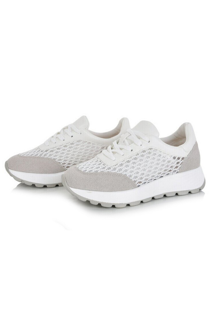 Кросівки жіночі