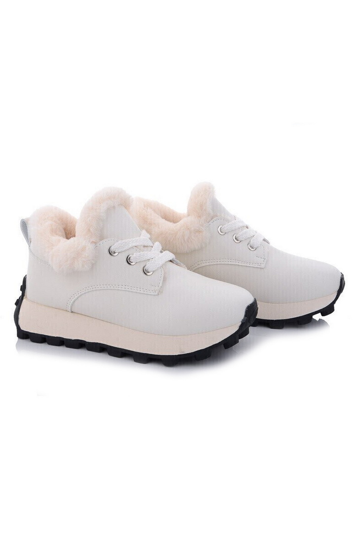 Кросівки жіночі