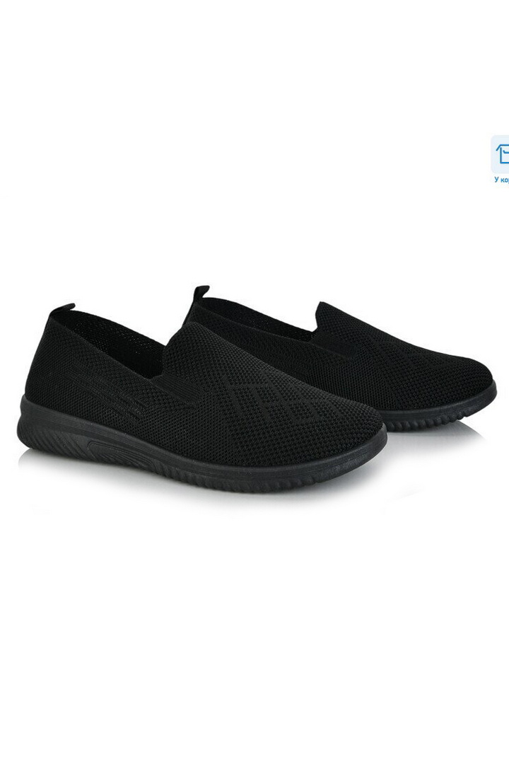 Кросівки жіночі